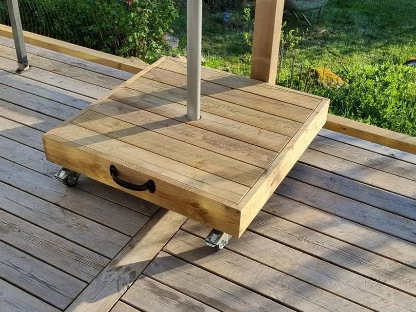 Parasollfot med hjul och handtag